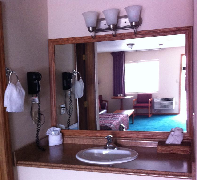 Legacy Inn Price Cameră foto