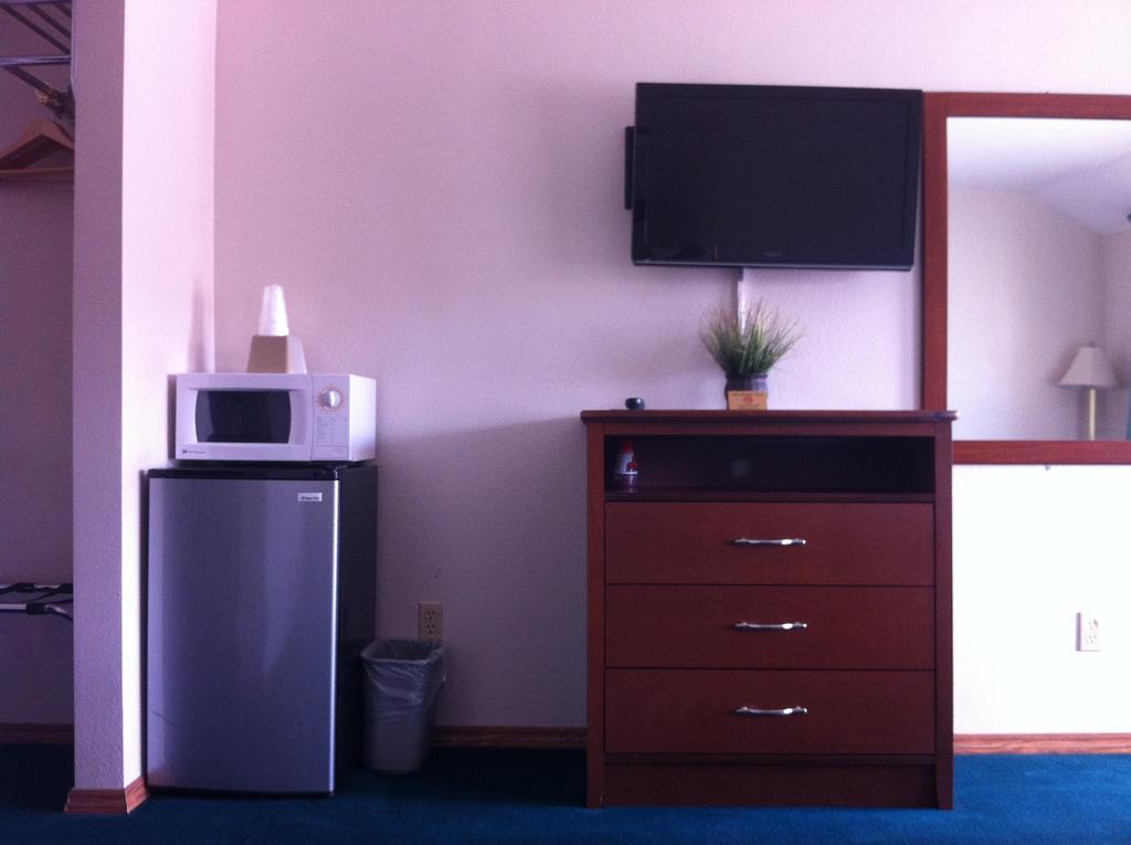 Legacy Inn Price Cameră foto