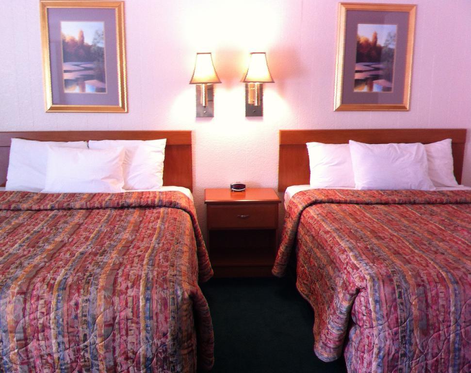 Legacy Inn Price Cameră foto